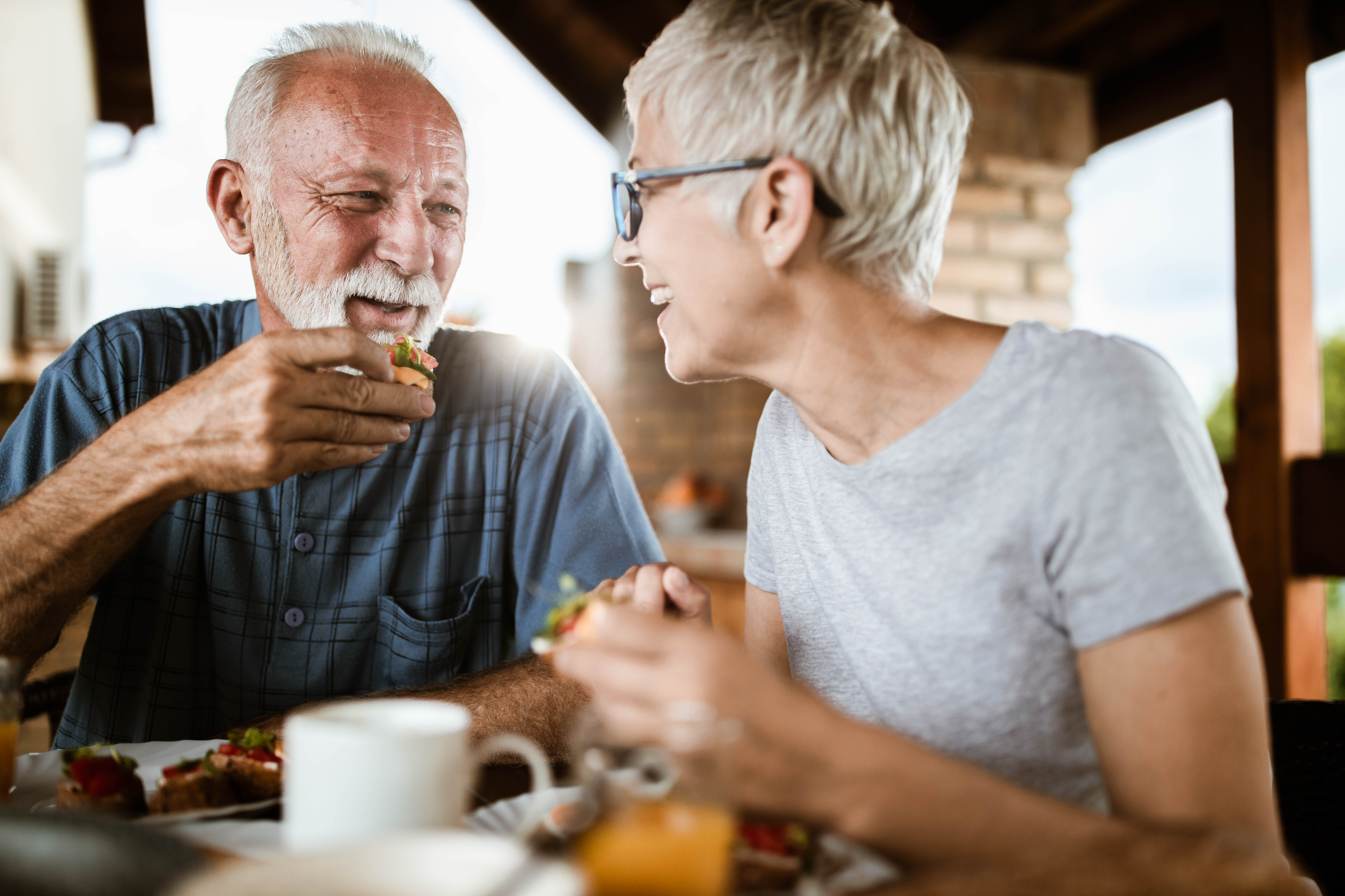 Senior couple enjoying a meal together